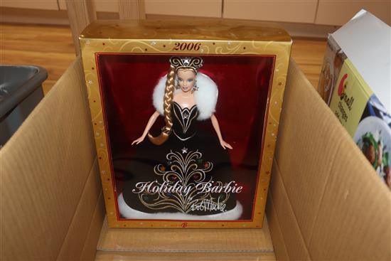 Five Bob Mackie Barbie dolls: Holiday Barbie (2), Mackie Brunette Brilliance, 45th Anniversary and The Sterling Silver